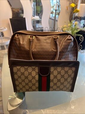 Gucci clutch and a Boston Valentino